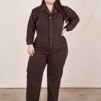 Ashley is 5'7" and wearing 1XLEveryday Jumpsuit in Espresso Brown