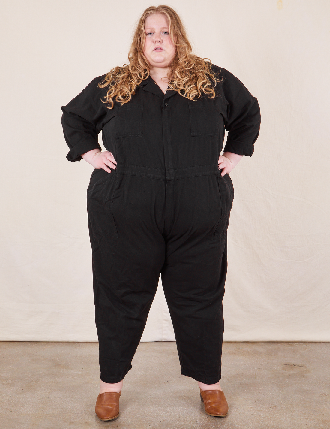 Catie is 5'11" and wearing 5XL Everyday Jumpsuit in Basic Black