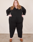Catie is 5'11" and wearing 5XL Everyday Jumpsuit in Basic Black