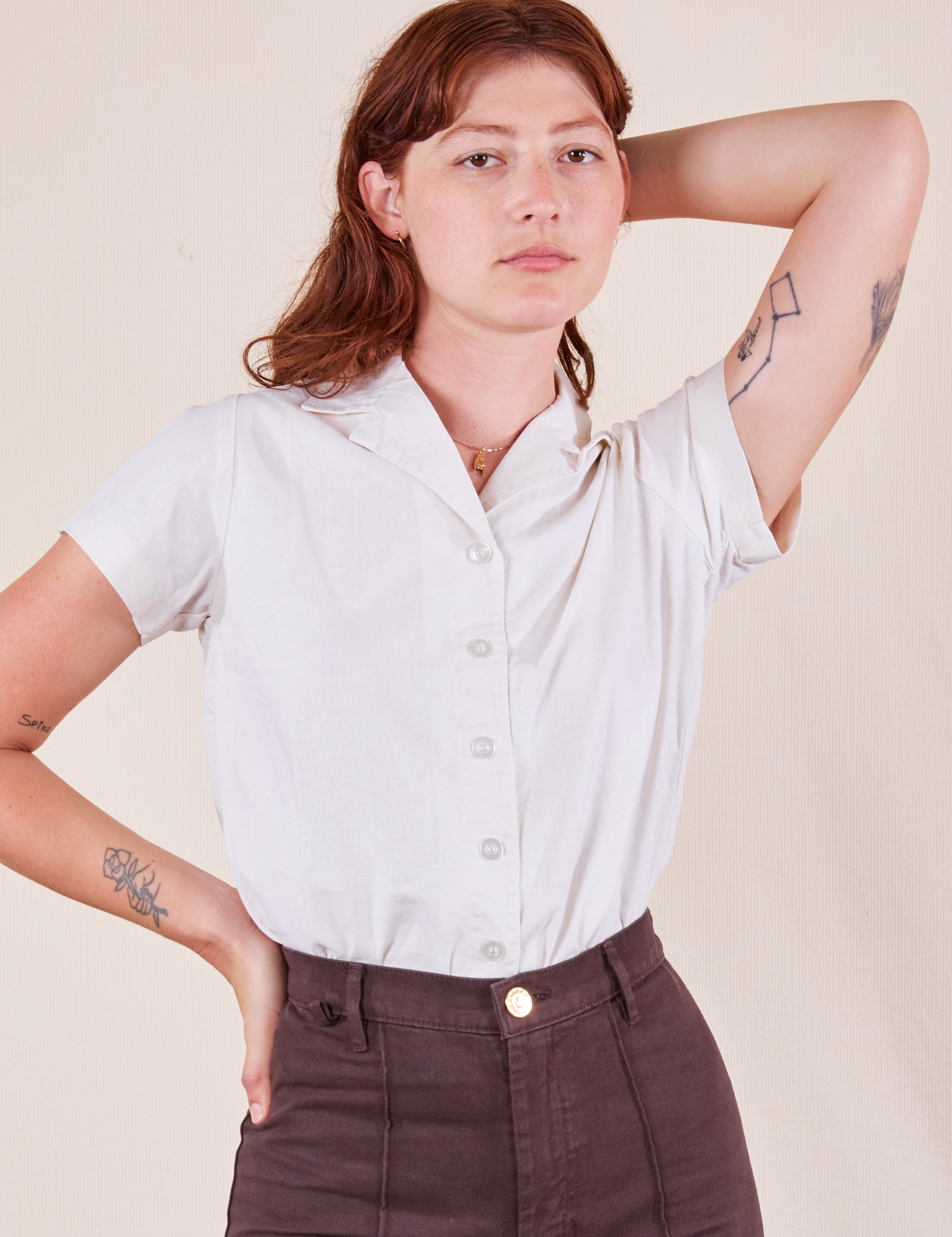 Alex is wearing P Pantry Button-Up in Vintage Tee White