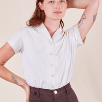 Alex is wearing P Pantry Button-Up in Vintage Tee White