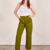 Work Pants in Olive Green on Allison wearing vintage off-white Tank Top