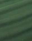 Bell Bottoms in Dark Emerald Green fabric detail close up