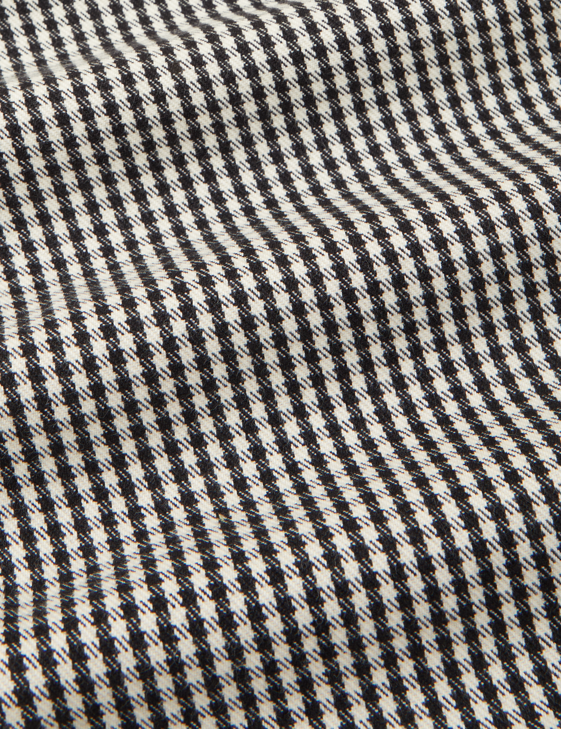 Checker Trousers in Black & White fabric detail close up