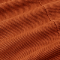 Long Sleeve Fisherman Polo in Burnt Terracotta fabric detail