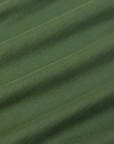 The Organic Vintage Tee in Dark Emerald Green fabric detail