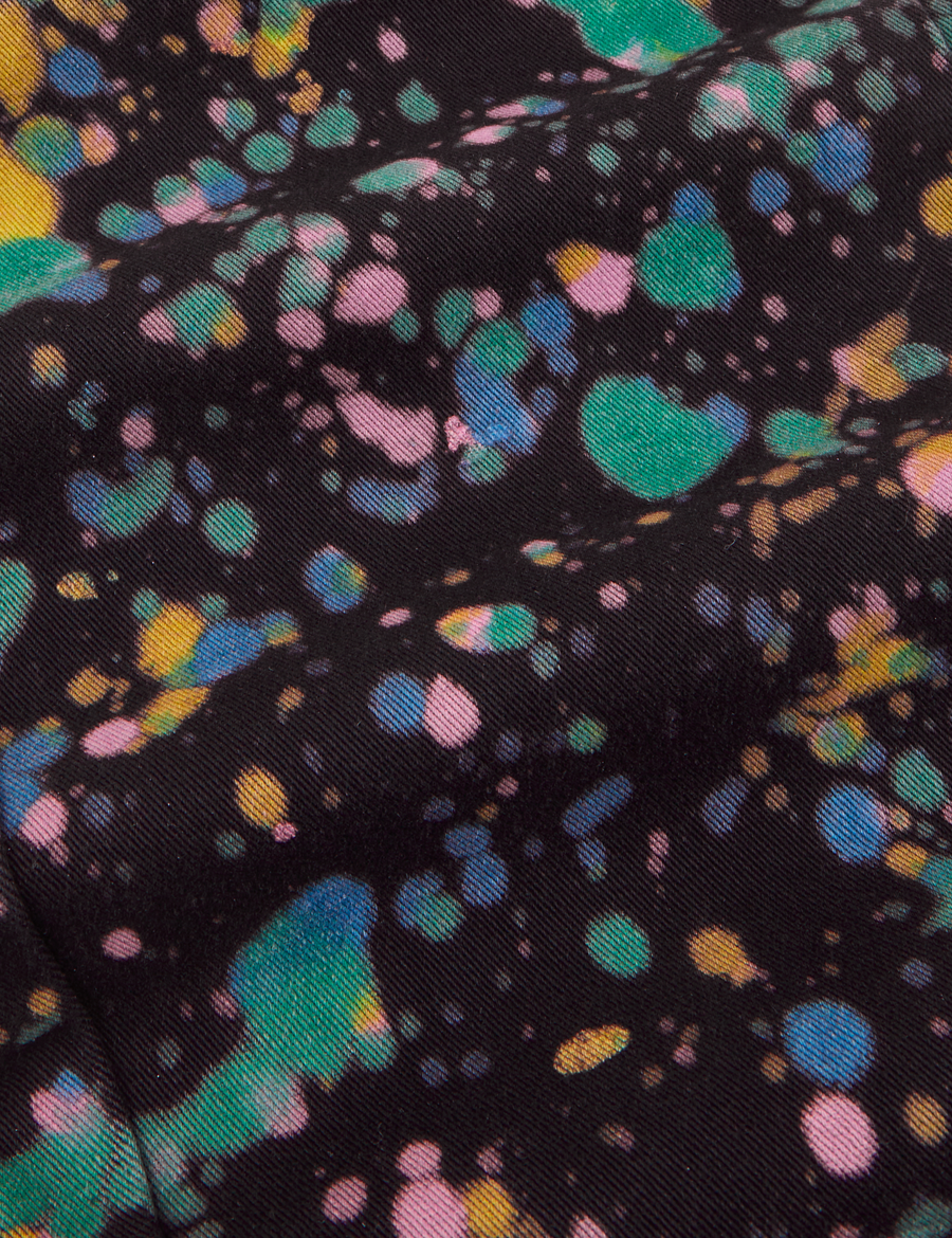 Marble Paint Splatter Work Pants fabric detail close up. Green, blue, yellow, pink paint splatter.
