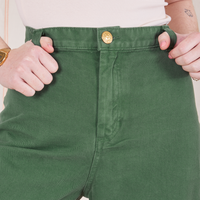 Front close up of Bell Bottoms in Dark Emerald Green worn by Hana