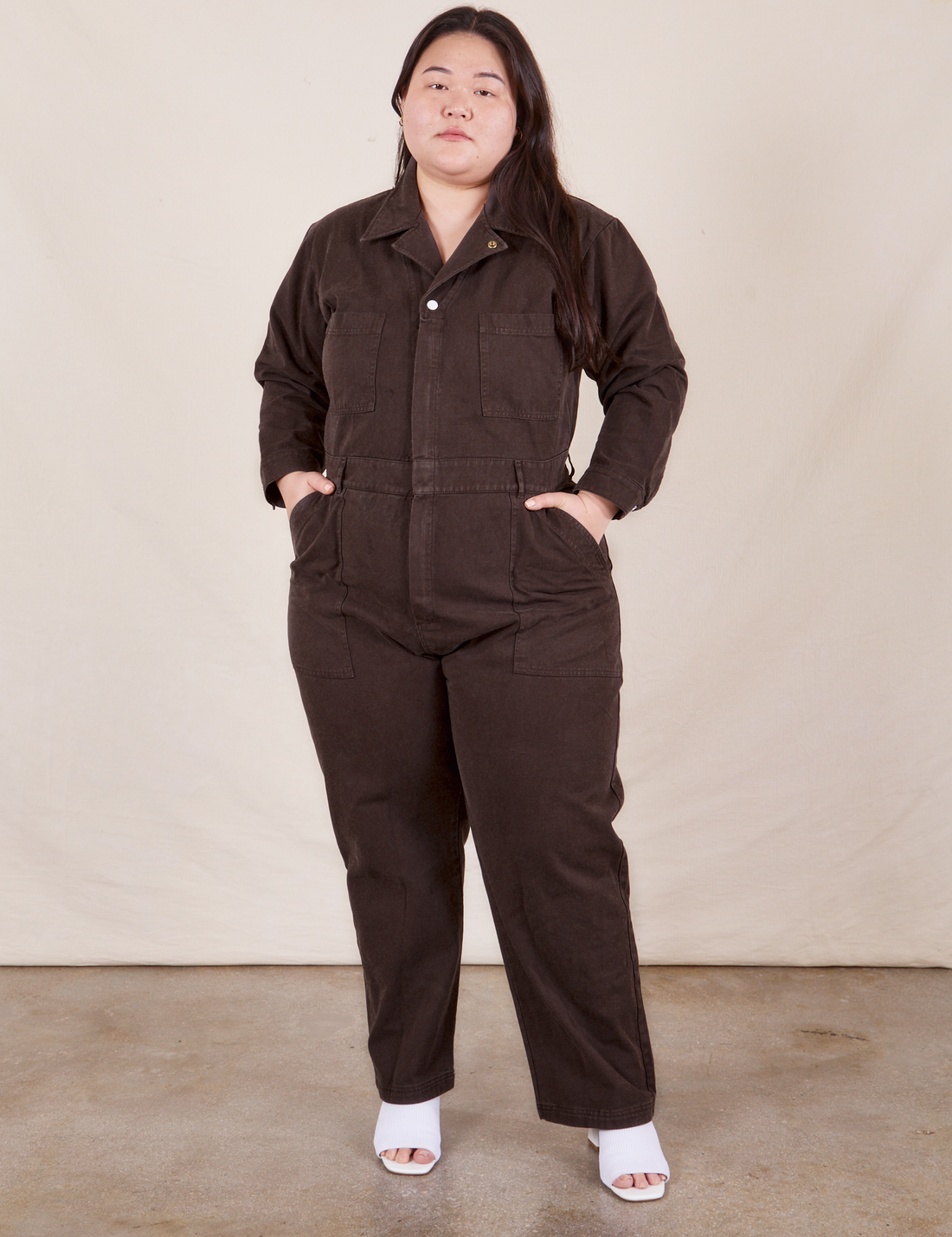 Ashley is wearing Everyday Jumpsuit in Espresso Brown