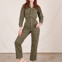 Alex is 5'8" and wearing XS Everyday Jumpsuit in Surplus Green