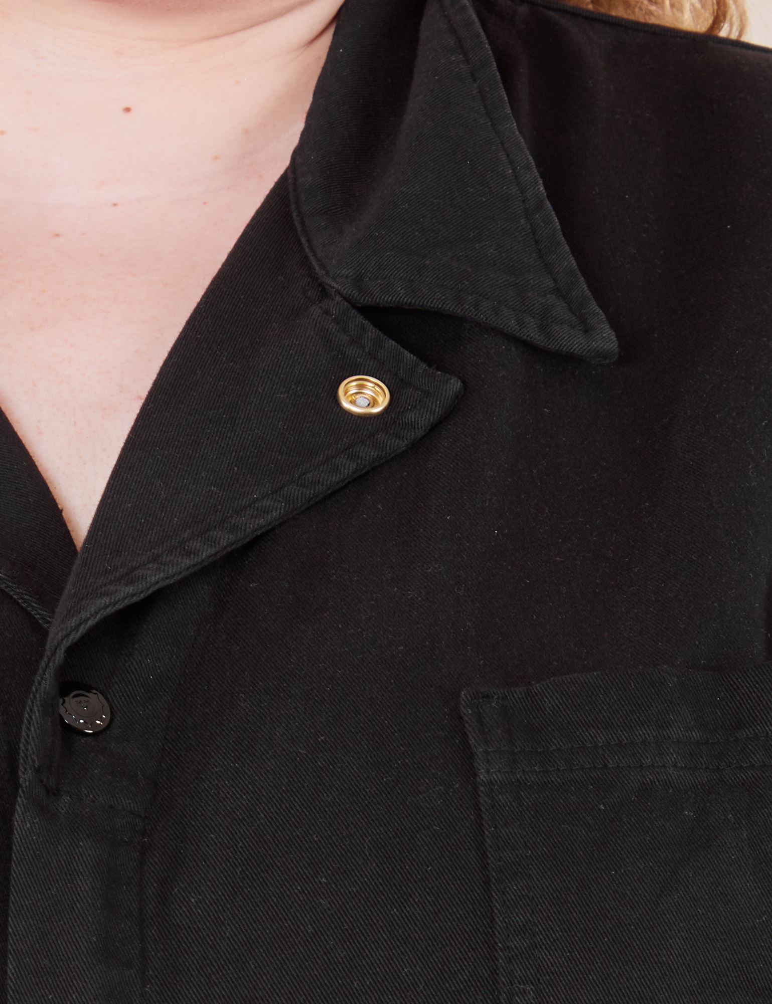 Front close up of Everyday Jumpsuit in Basic Black worn by Catie