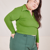 Long Sleeve Fisherman Polo in Bright Olive side view on Ashley wearing dark emerald green Western Pants