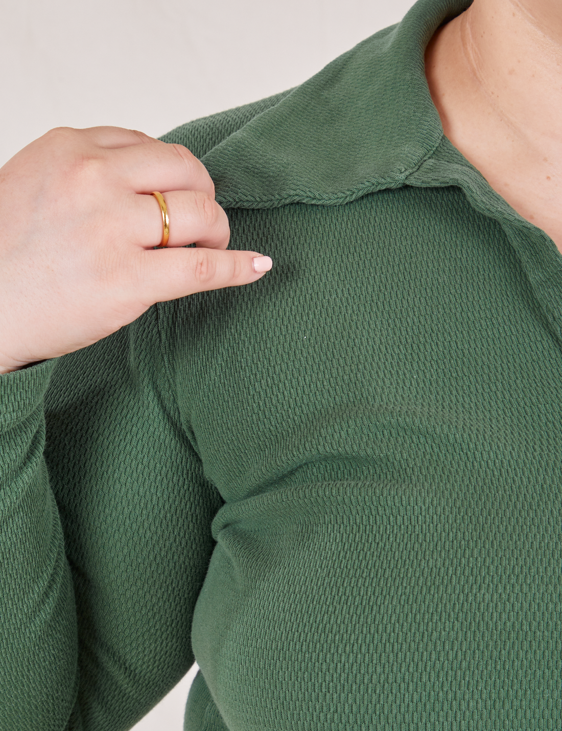 Long Sleeve Fisherman Polo in Dark Emerald Green front close up on Ashley