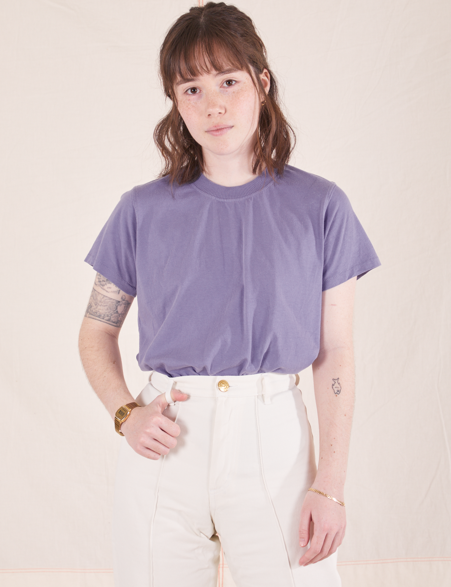 Hana is wearing Organic Vintage Tee in Faded Grape and vintage off-white Western Pants