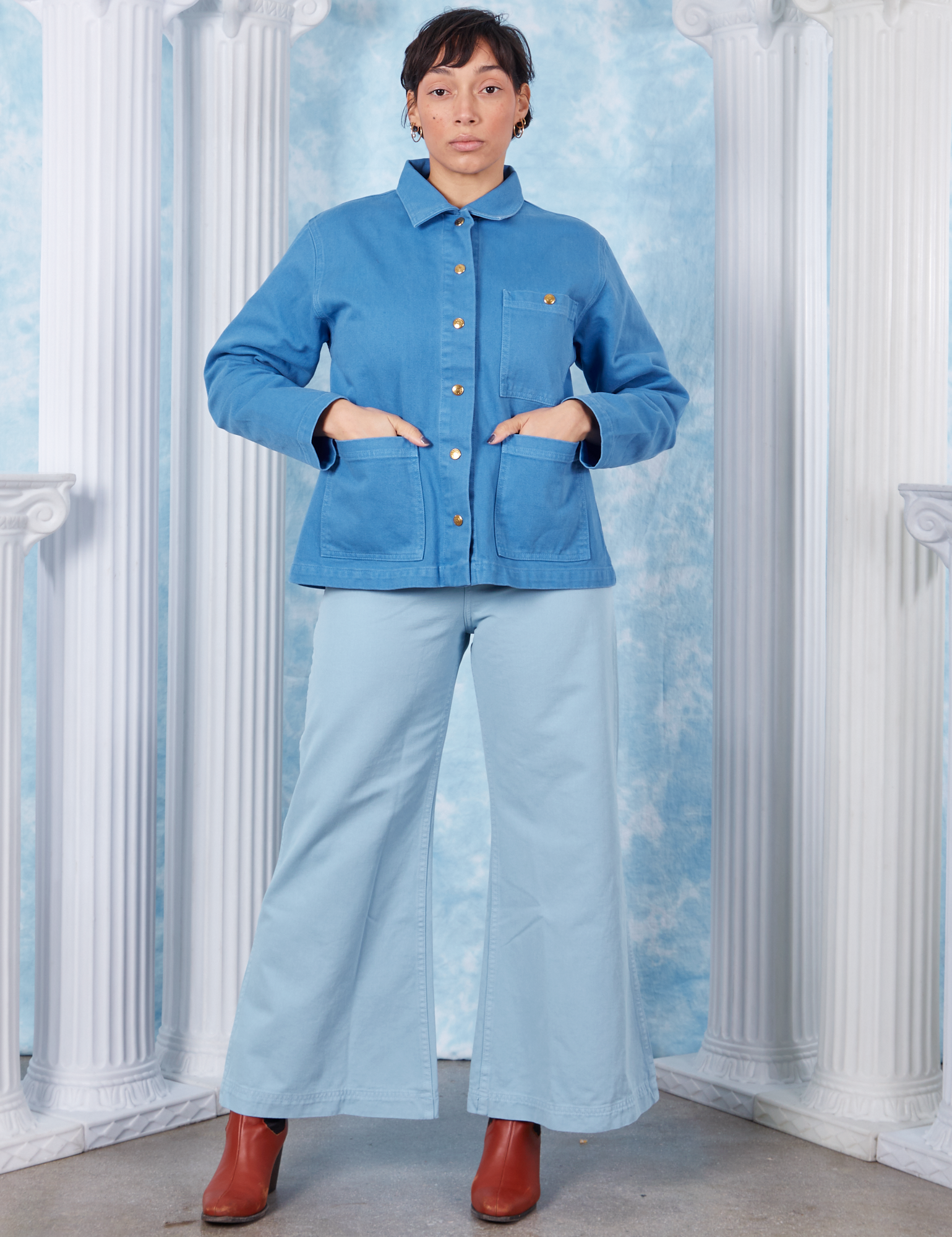 Neoclassical Work Jacket in Blue Venus buttoned up on Tiara wearing baby blue Bell Bottoms