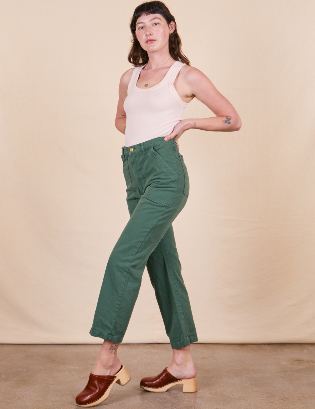 Work Pants in Dark Emerald Green side view on Alex