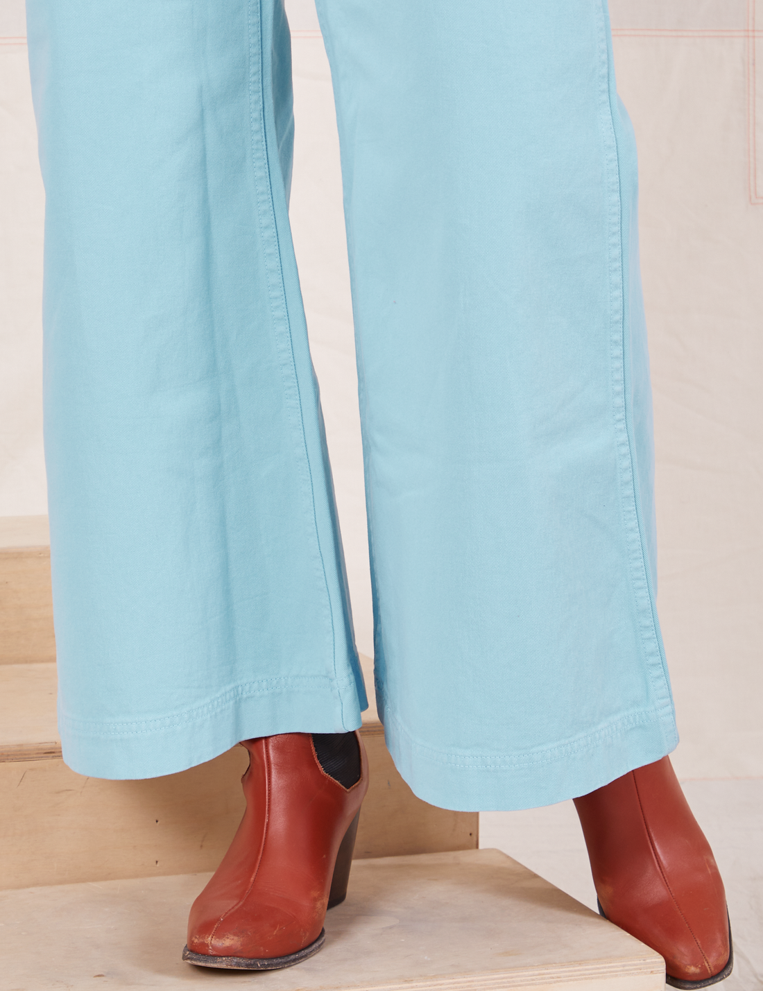 Pant leg close up of Bell Bottoms in Baby Blue worn by Tiara