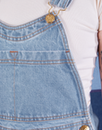 Indigo Denim Original Overalls in Light Wash front close up on Alex