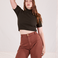 Allison is wearing 1/2 Sleeve Essential Turtleneck in Espresso Brown and fudgesicle brown Bell Bottoms