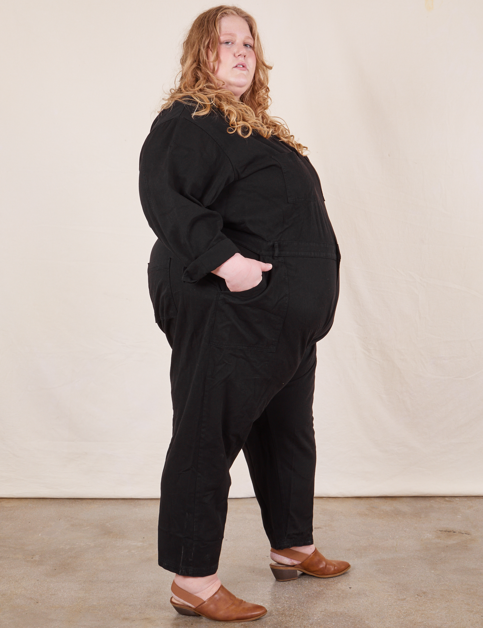 Side view of Everyday Jumpsuit in Basic Black worn by Catie