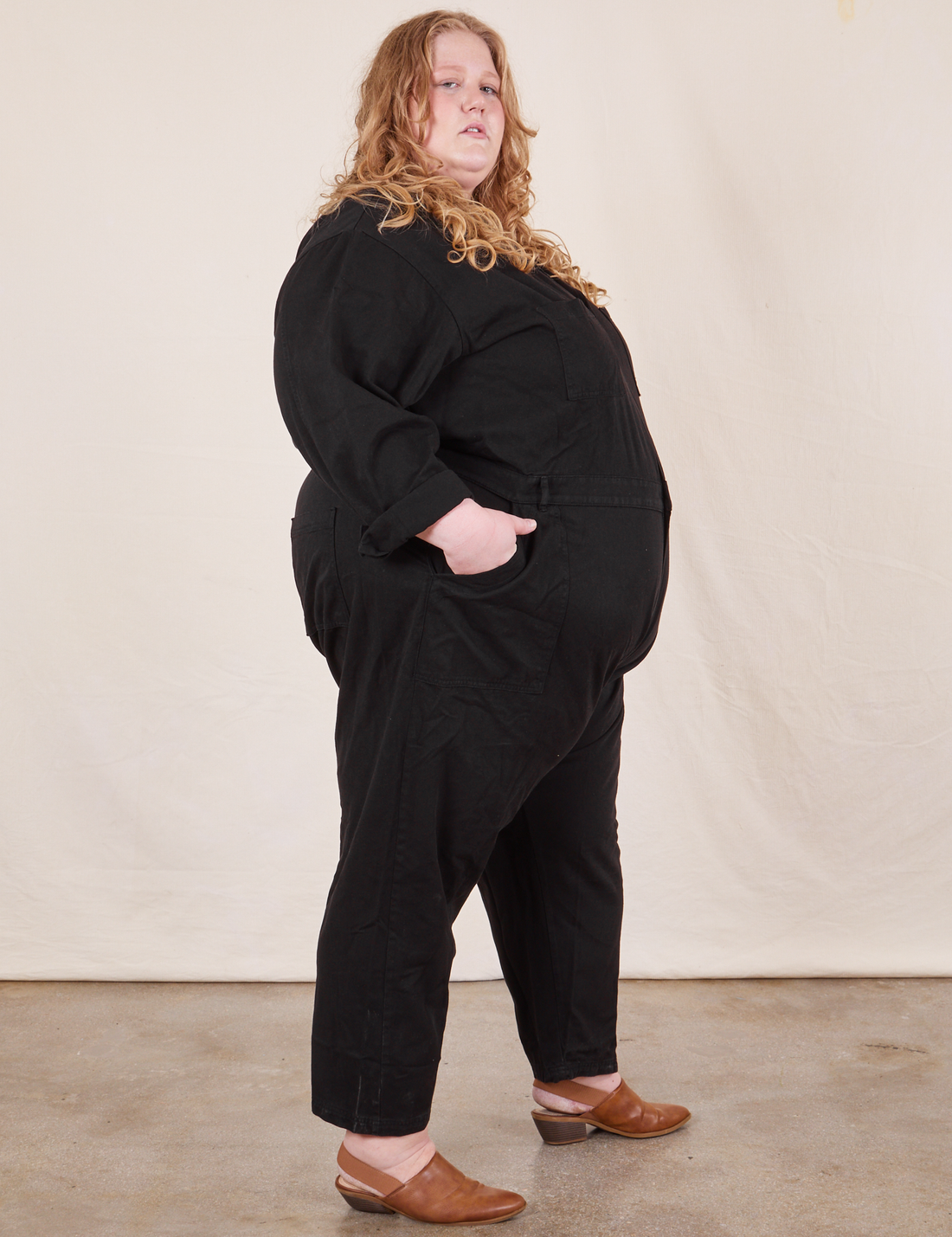Side view of Everyday Jumpsuit in Basic Black worn by Catie