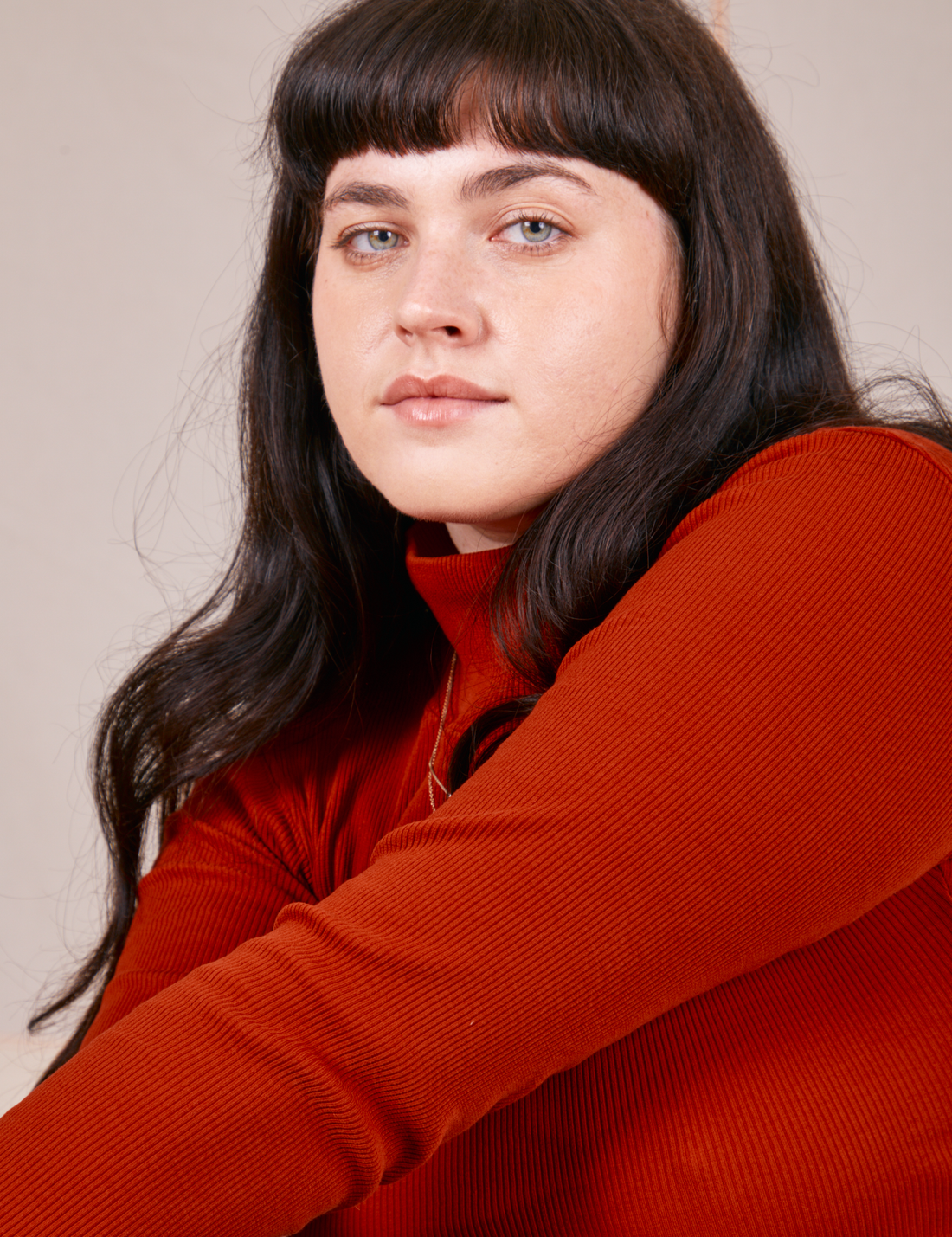 Close up of Essential Turtleneck in Paprika worn by Sydney