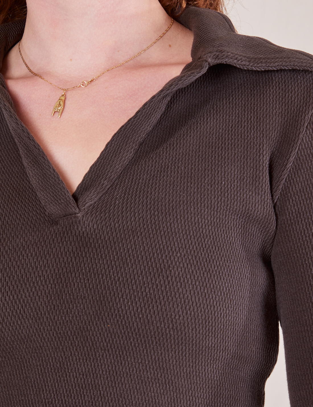 Front close up of Long Sleeve Fisherman Polo in Espresso Brown worn by Alex