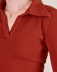 Front close up of Long Sleeve Fisherman Polo in Paprika worn by Alex