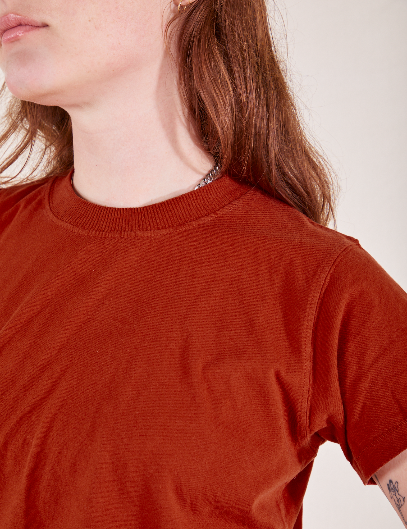 The Organic Vintage Tee in Paprika front close up on Alex