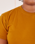 The Organic Vintage Tee in Spicy Mustard front close up on Morgan