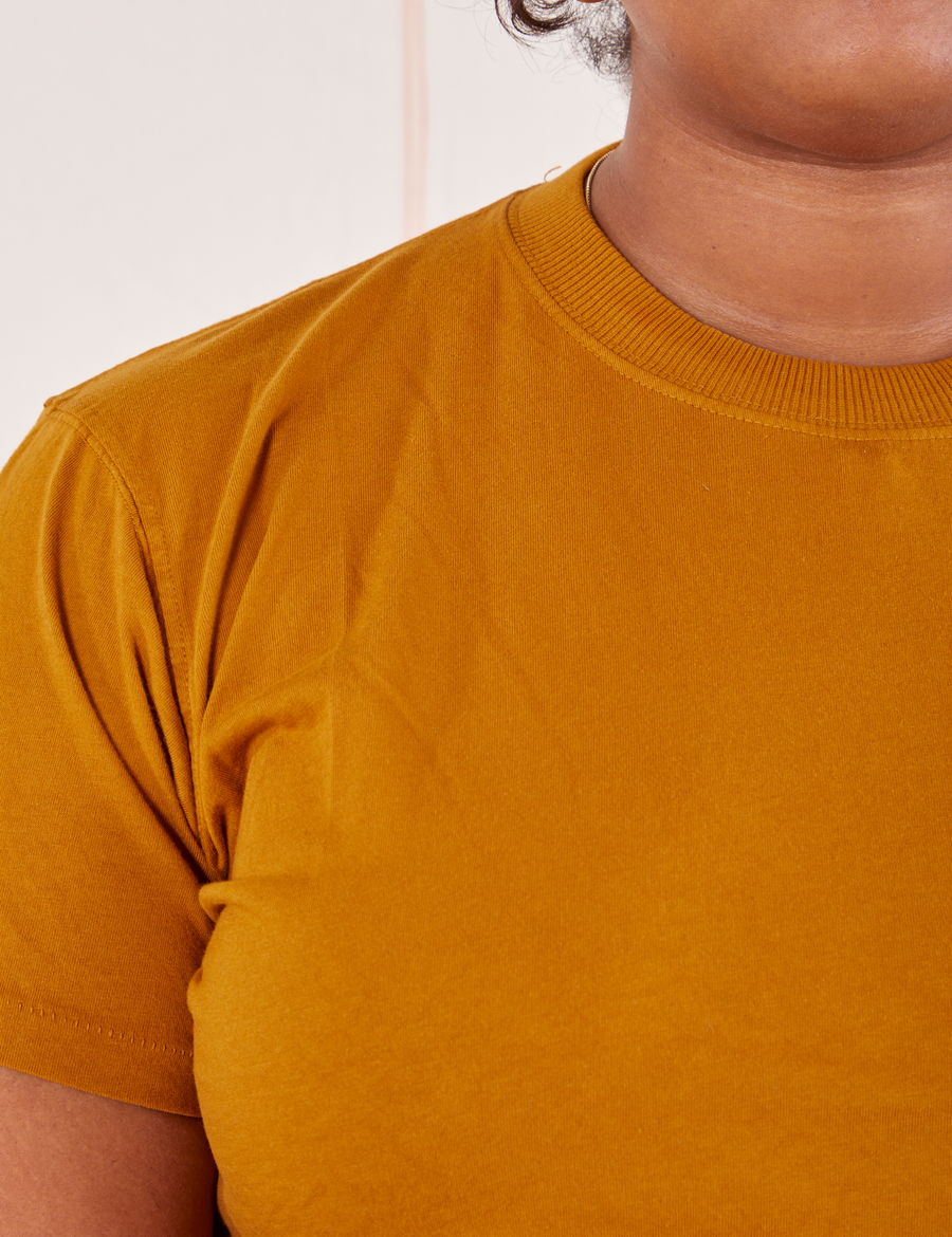The Organic Vintage Tee in Spicy Mustard front close up on Morgan