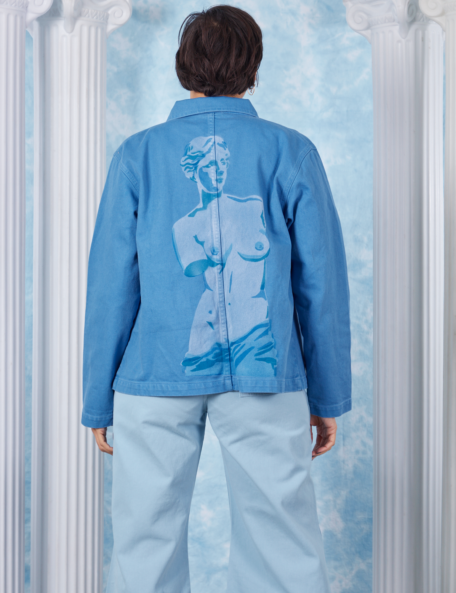 Neoclassical Work Jacket in Blue Venus back view on Tiara wearing baby blue Bell Bottoms