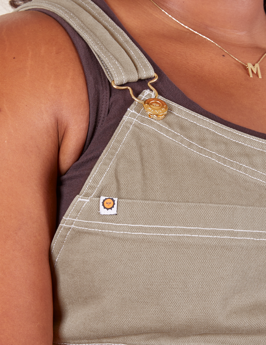 Original Overalls in Khaki Grey front close up white stitching and gold hardware