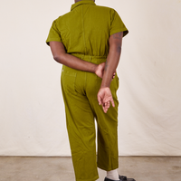 Back view of Short Sleeve Jumpsuit in Olive Green worn by Elijah