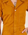 Short Sleeve Jumpsuit in Spicy Mustard front close up on Jesse