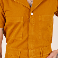 Short Sleeve Jumpsuit in Spicy Mustard front close up on Jesse
