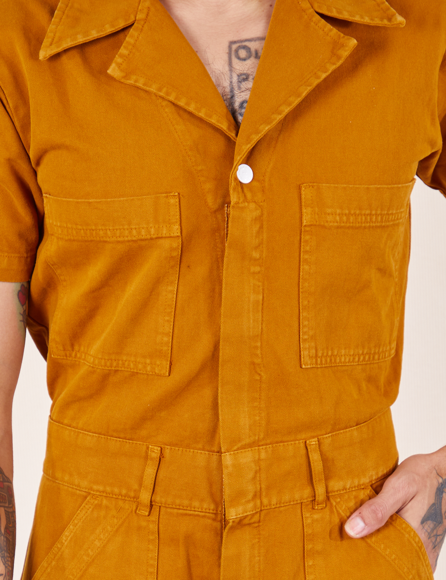 Short Sleeve Jumpsuit in Spicy Mustard front close up on Jesse