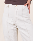 Western Pants in Vintage Tee Off-White front close up on Jesse