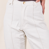 Western Pants in Vintage Tee Off-White front close up on Jesse