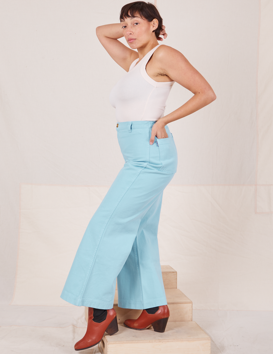 Side view of Bell Bottoms in Baby Blue and vintage off-white Tank Top worn by Tiara