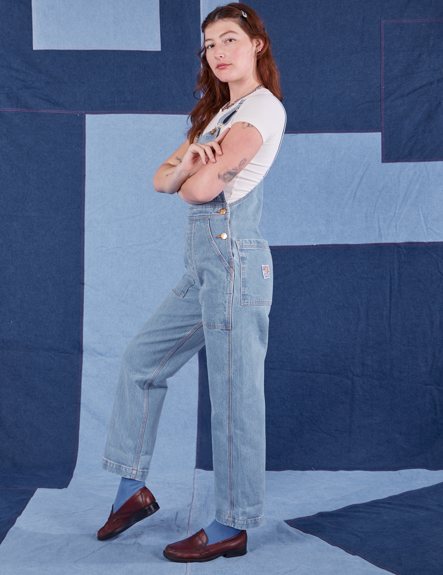 Side view of Indigo Denim Original Overalls in Light Wash worn by Alex