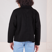 Back view of Denim Work Jacket in Basic Black worn by Jesse