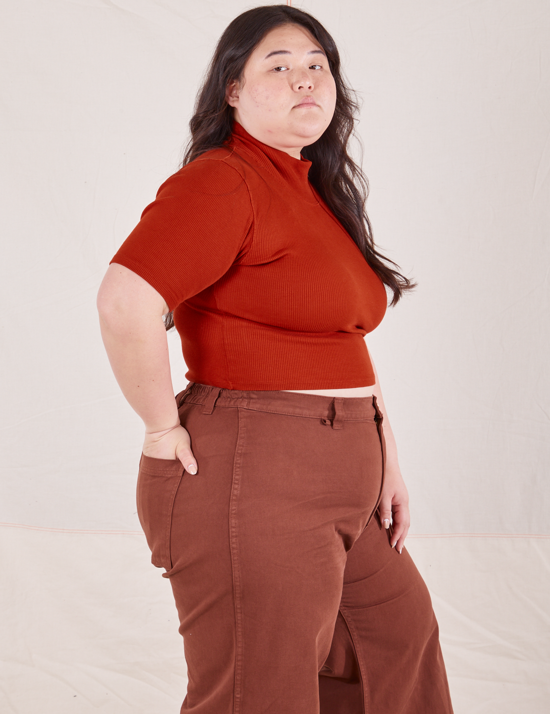 1/2 Sleeve Essential Turtleneck in Paprika side view on Ashley wearing fudgesicle brown Bell Bottoms