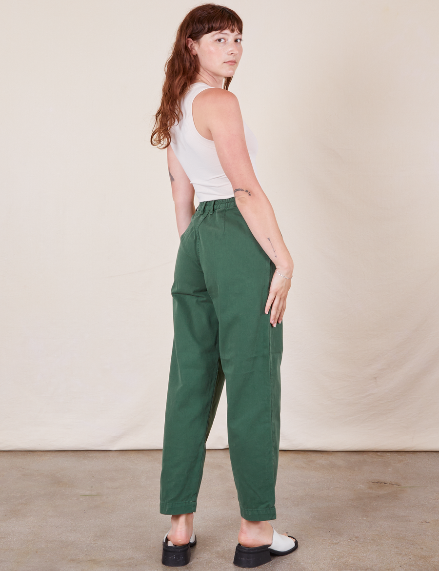 Back view of Heavyweight Trousers in Dark Emerald Green worn by Alex