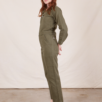 Side view of Everyday Jumpsuit in Surplus Green worn by Alex