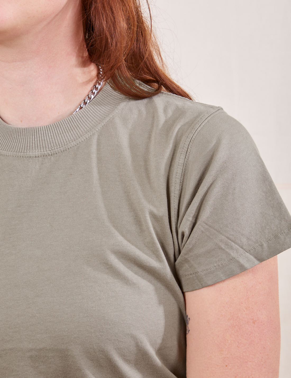 The Organic Vintage Tee in Khaki Grey front close up on Alex