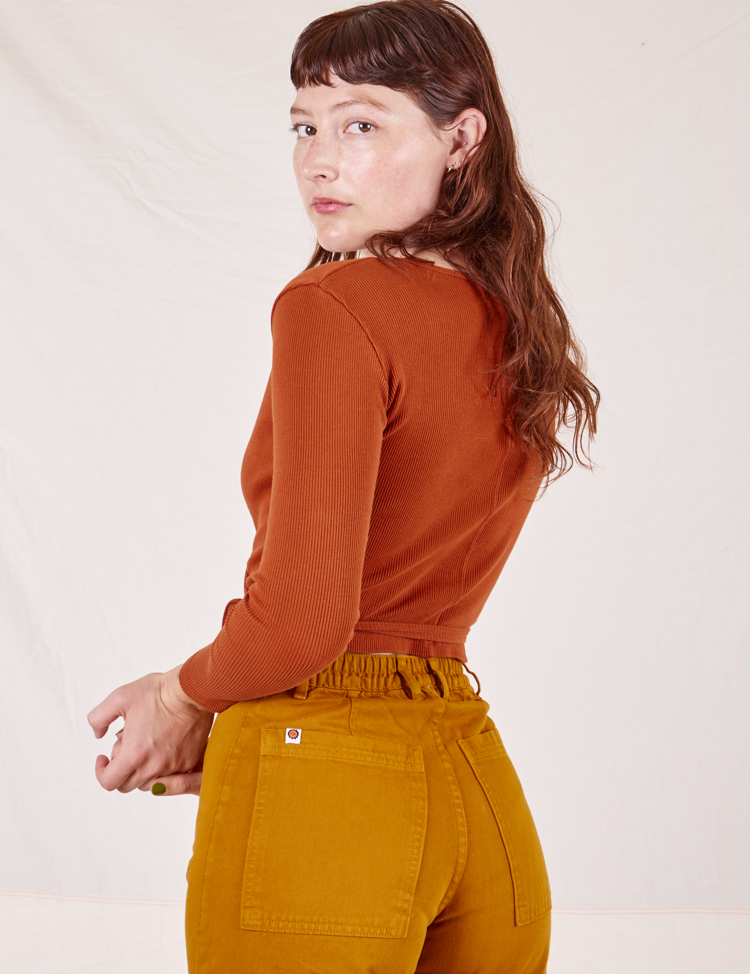 Wrap Top in Burnt Terracotta back view on Alex