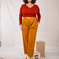 Wrap Top in Paprika on Lana wearing Spicy Mustard trousers