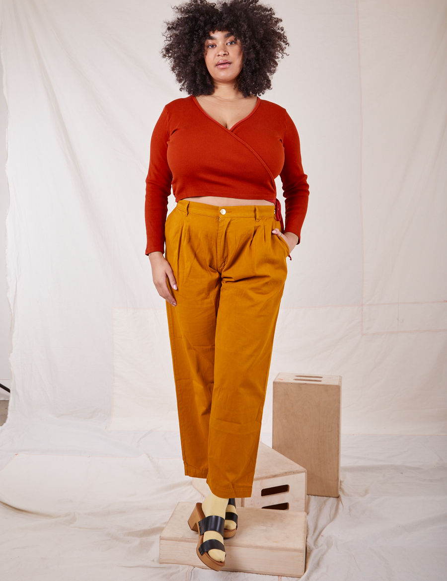 Wrap Top in Paprika on Lana wearing Spicy Mustard trousers