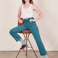 Work Pants in Marine Blue on Alex wearing vintage off-white Tank Top sitting on vintage stool